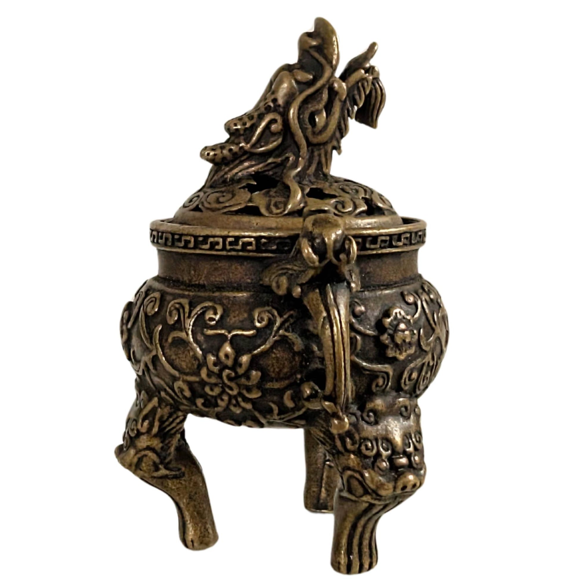 Handy bronze incense burner with floral relief and dragon decoration on top.