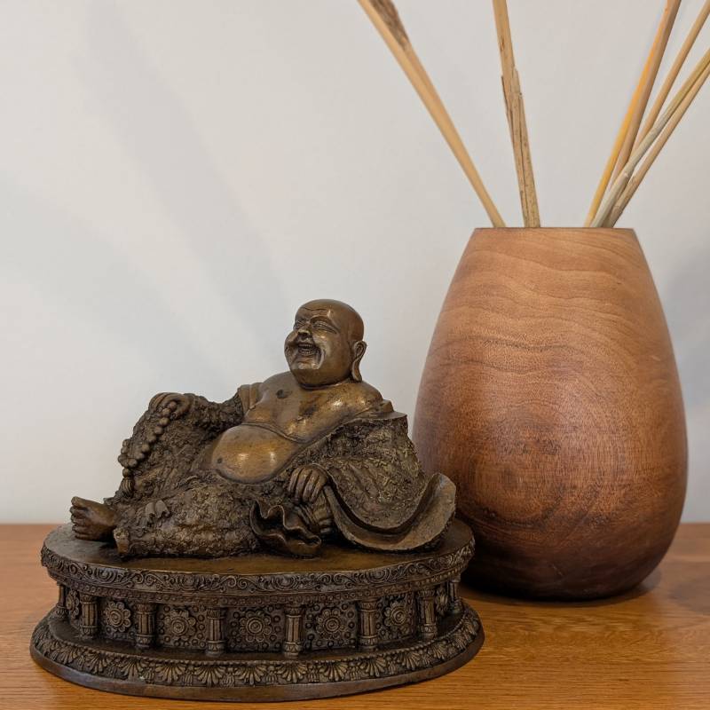 Reclining bronze Budai statue from China