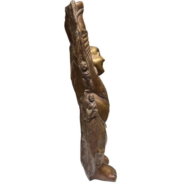 Detail of the charming child figures climbing up the Budai.
