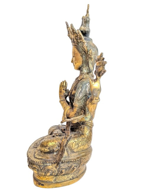 Chenrezig bronze with a warm golden patina and hand-chasing