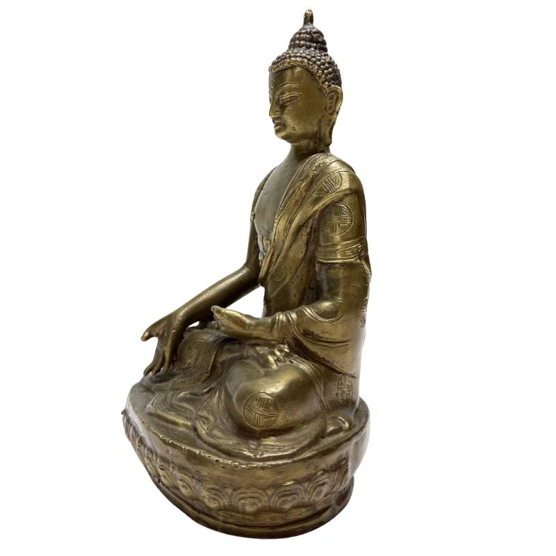 Antique Chinese bronze Buddha statue in a meditation pose