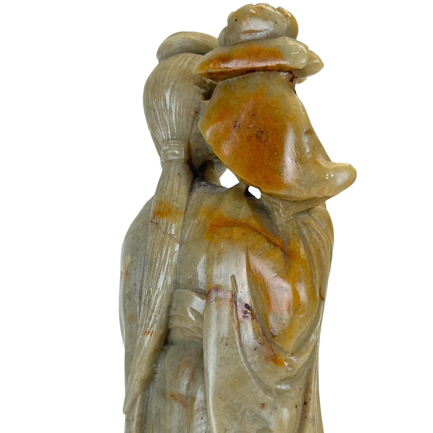Traditional Chinese stone craftsmanship showing the details of an immortal deity.