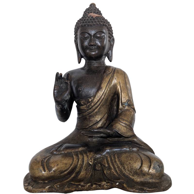 Chinese bronze Buddha statue seated in Vitarka mudra with remnants of gilding