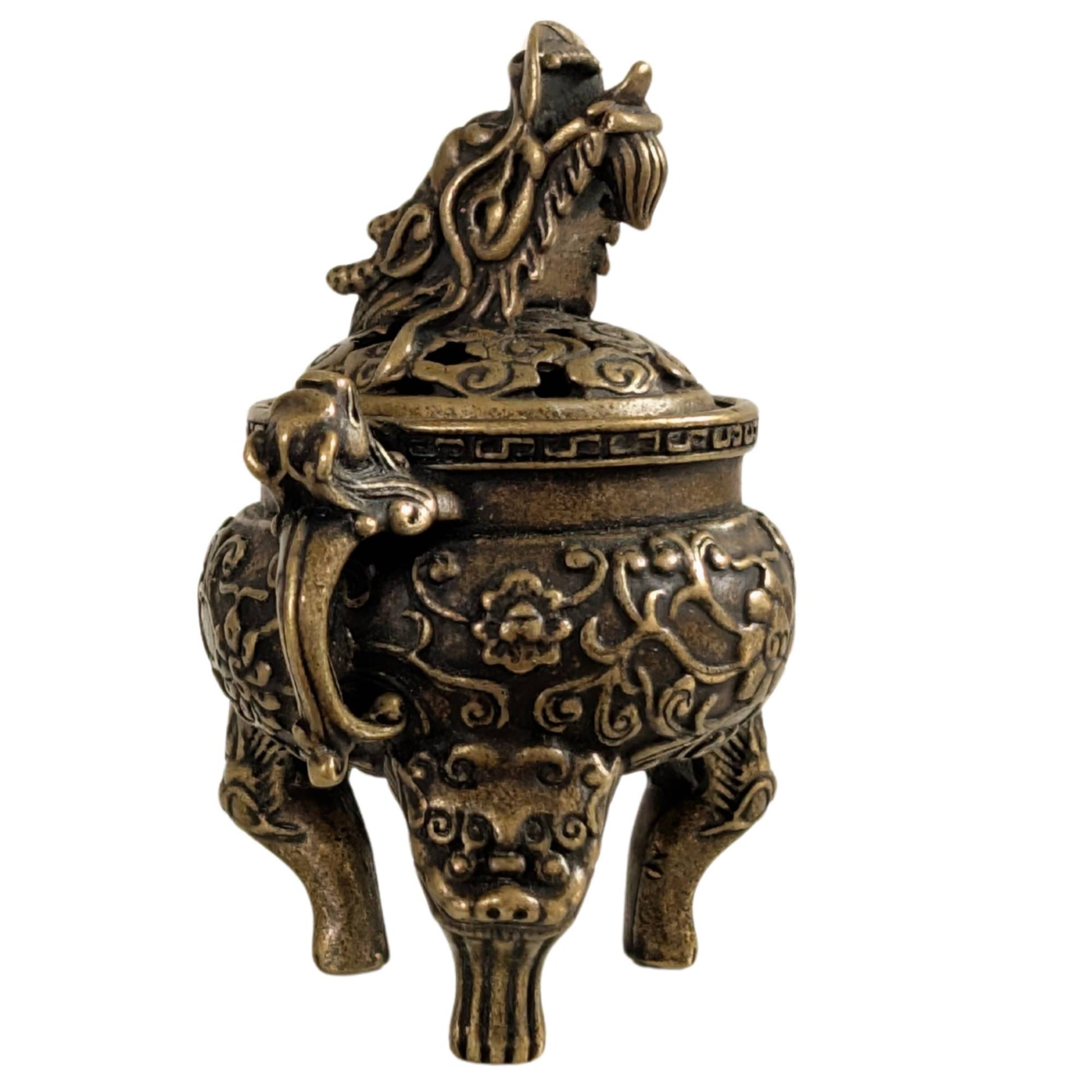 Small bronze tripod censer with openwork lid and traditional motifs.
