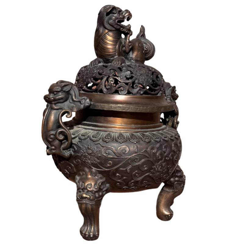 Chinese bronze incense burner with openwork lid

