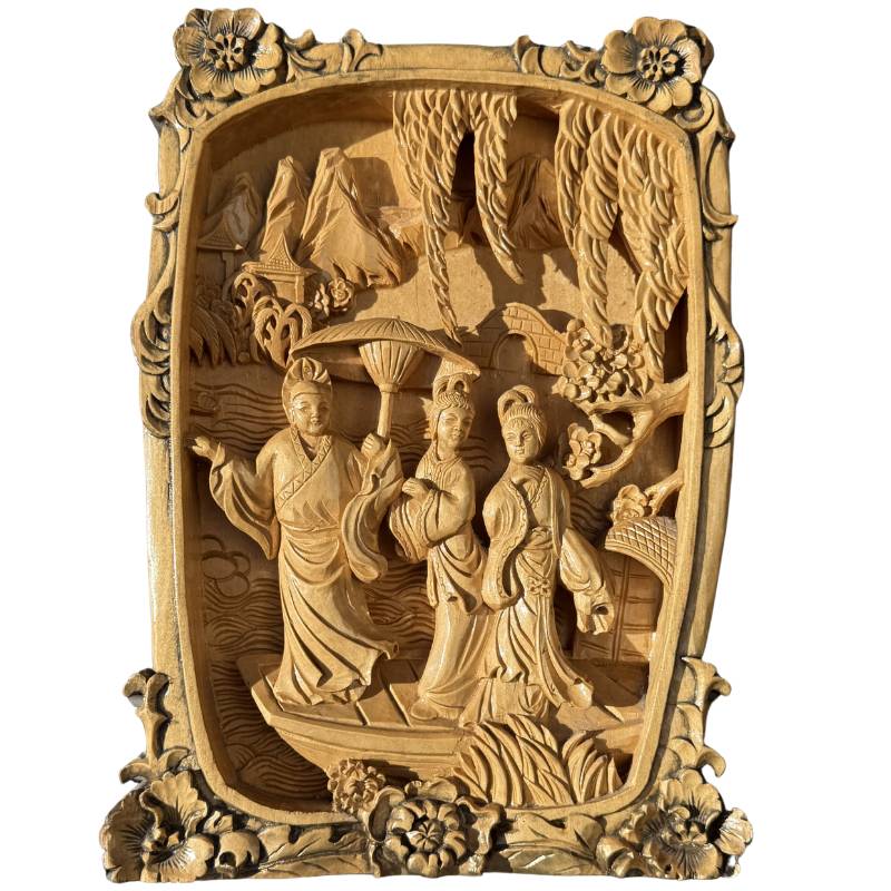 Chinese wooden relief with a scene from the Legend of the White Snake with figures in a boat
