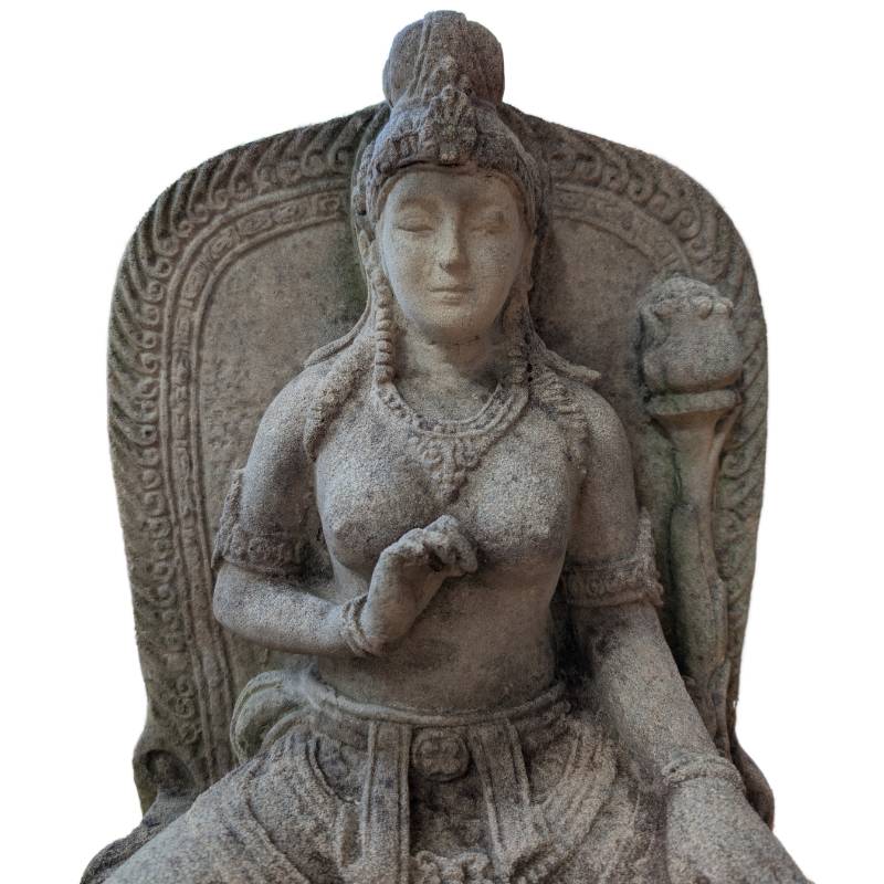 Close-up of the serene face of Tara sandstone sculpture