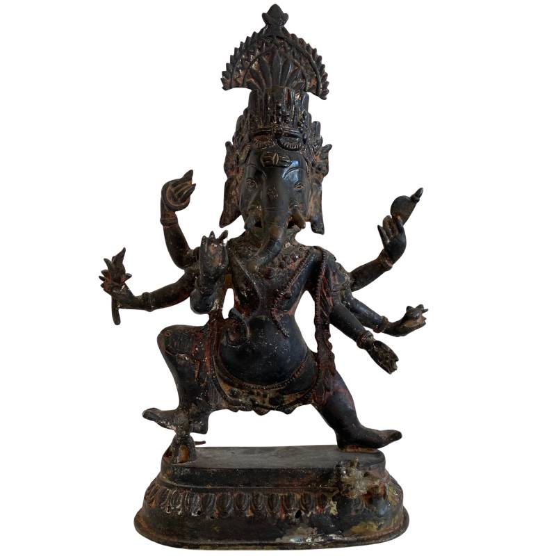 Antique bronze statue of a dancing Ganesha with six arms, Southeast Asian temple statue