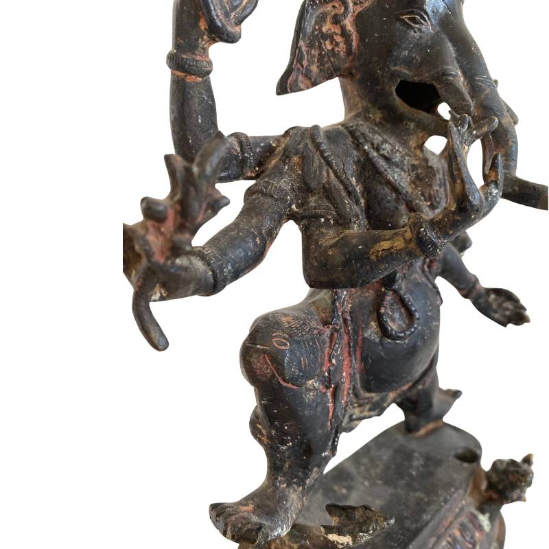 Full view of an antique bronze dancing Ganesha with six arms