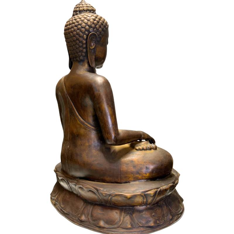 Close-up of the Bhumisparsha Mudra (earth touching gesture) on antique bronze.