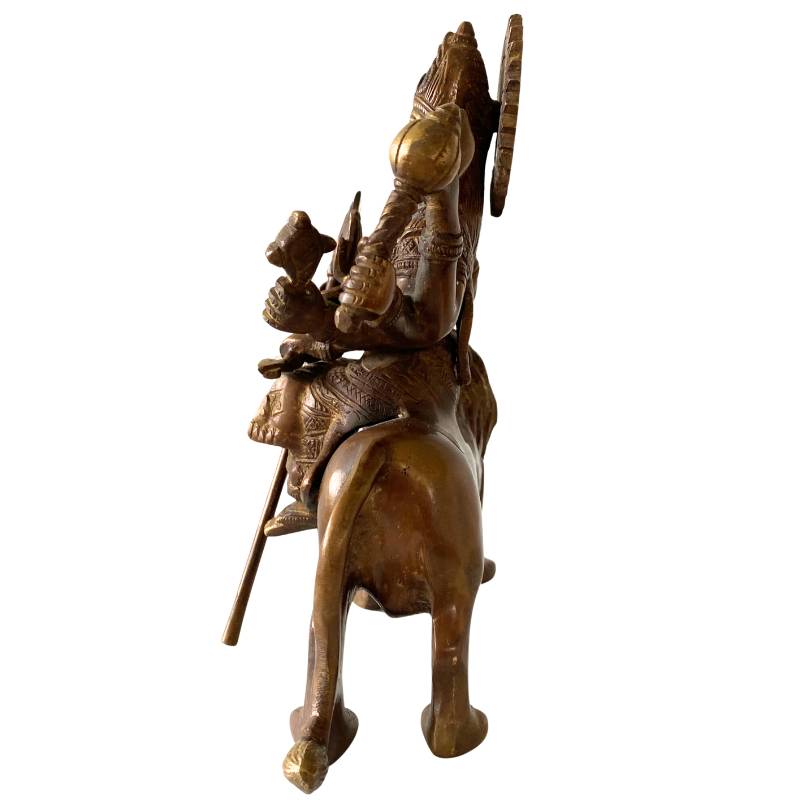 Detail of bronze Durga statue with crown and jewelry – Hindu goddess