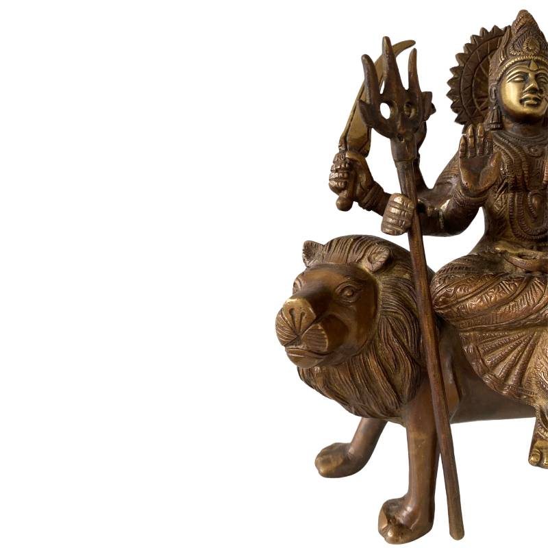 Detail of bronze Durga statue with crown and jewelry – Hindu goddess