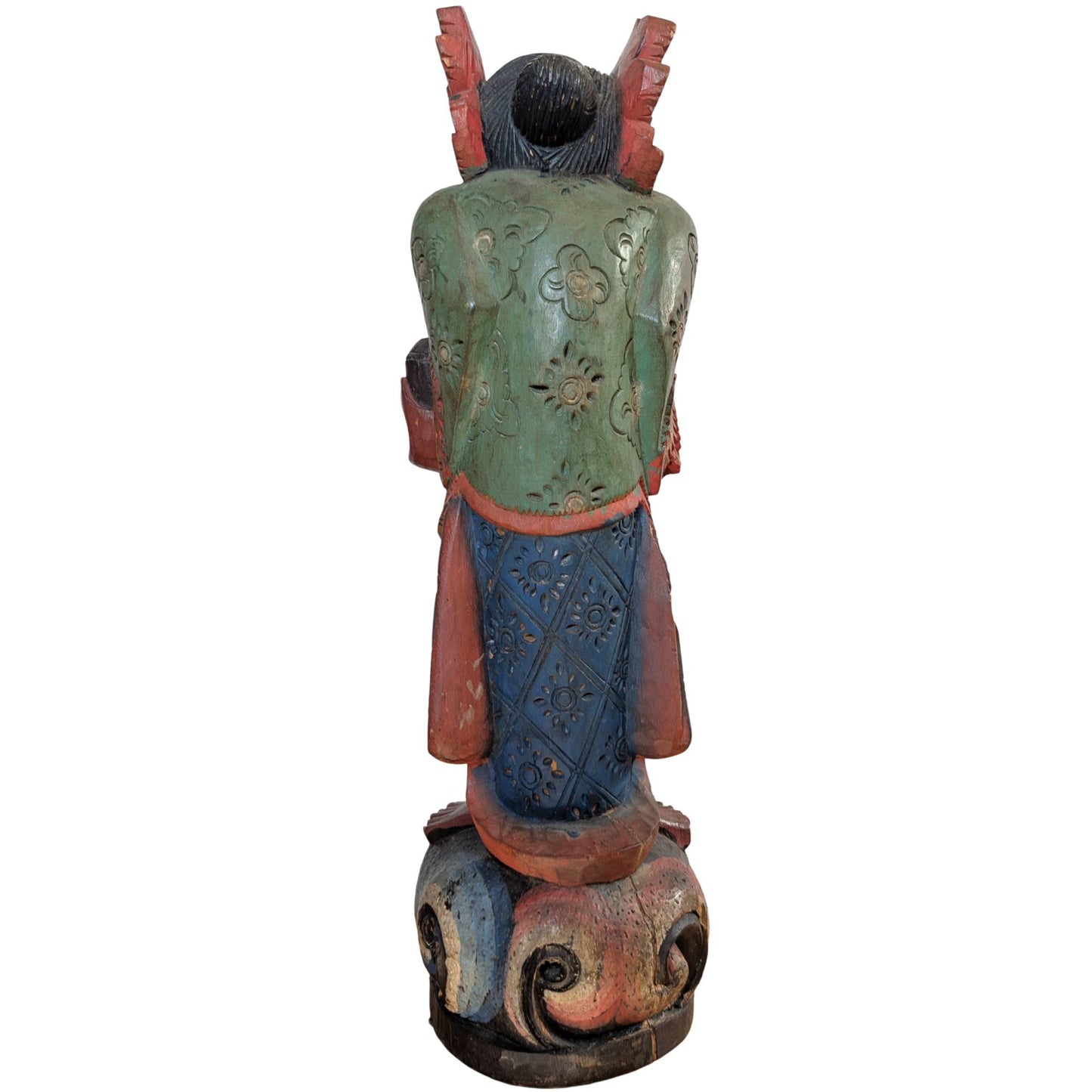 Detail of the hands and the ceremonial attributes of the temple guardian