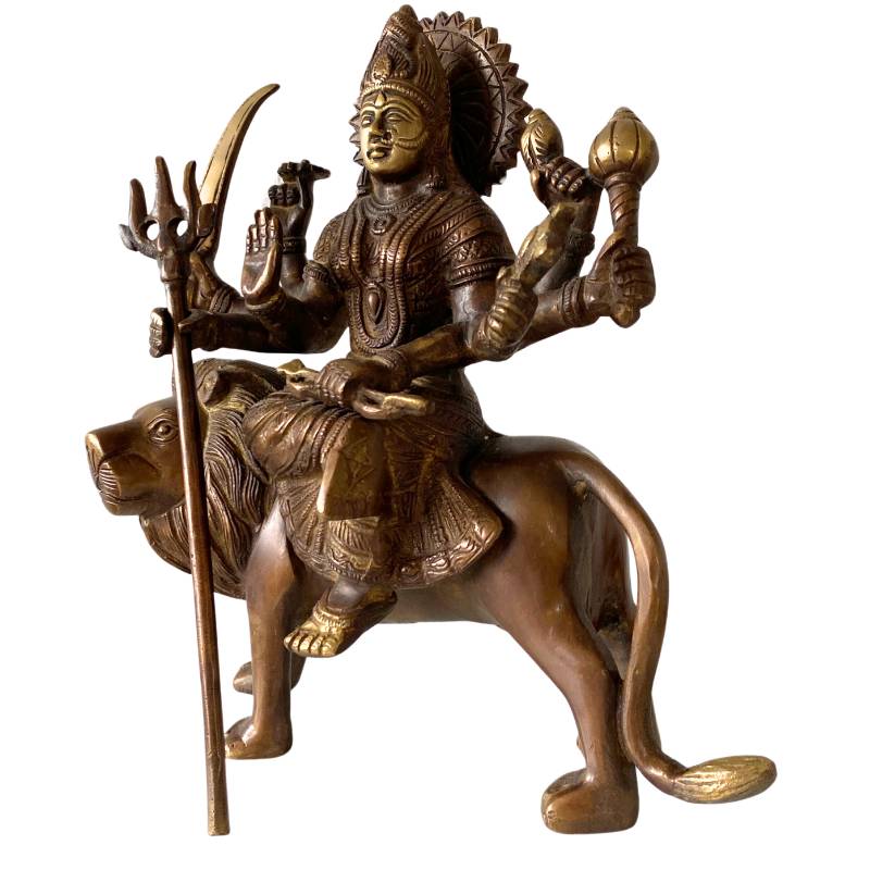 Detail of old bronze Durga statue with crown and jewelry – Hindu goddess statue