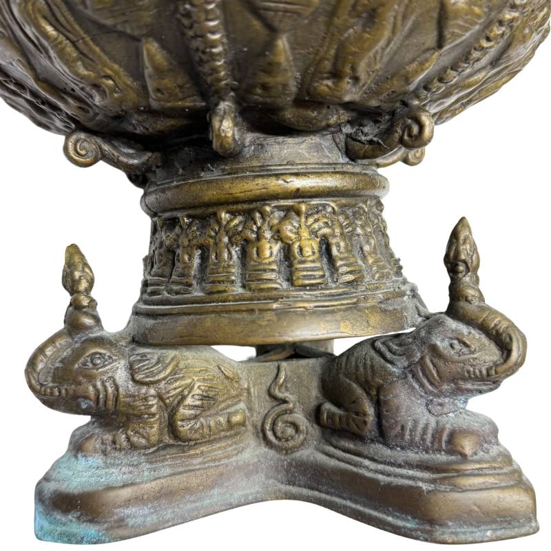 Detail of the elephant base of an antique Thai reliquary
