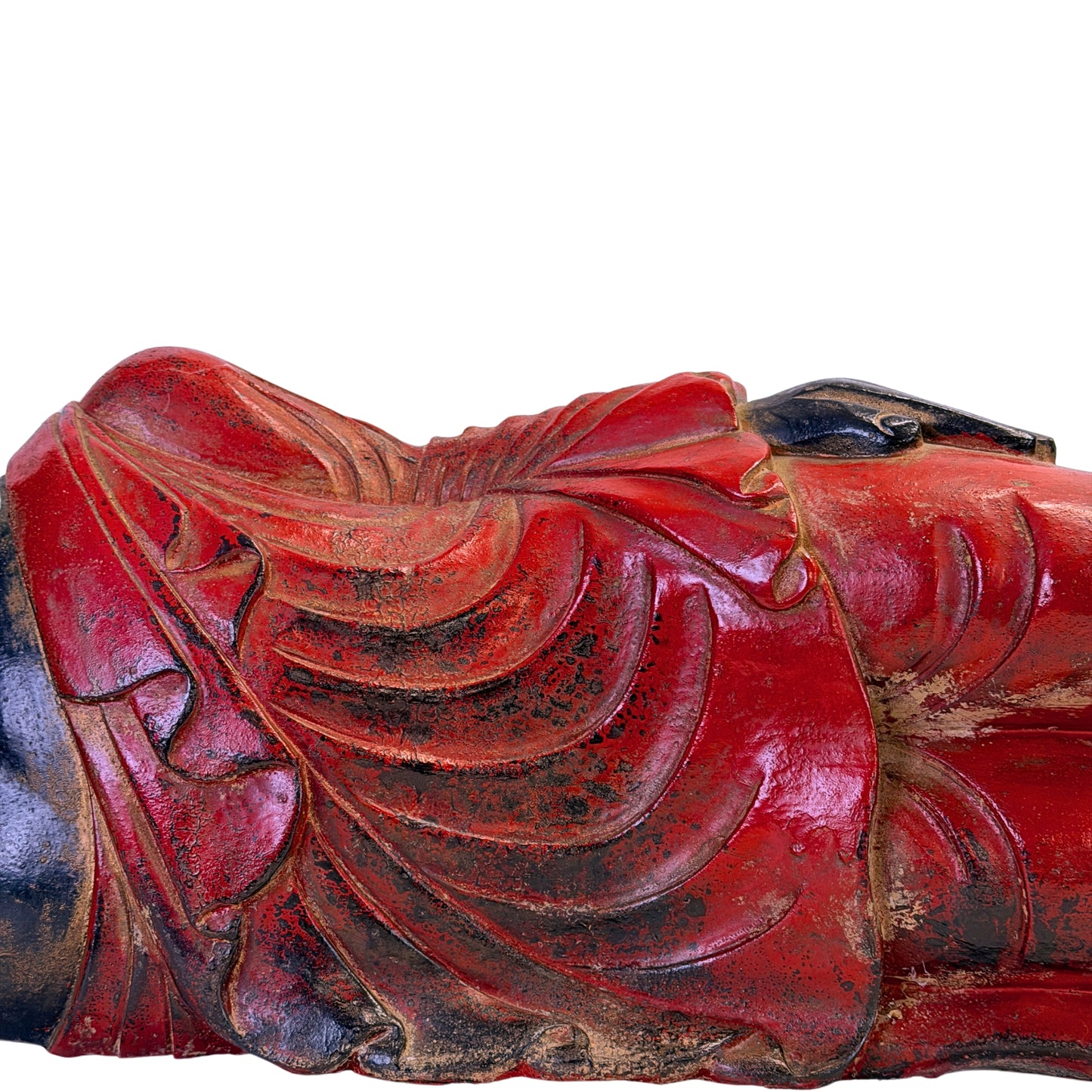 Detail of red polychrome robe folds with remnants of gilding