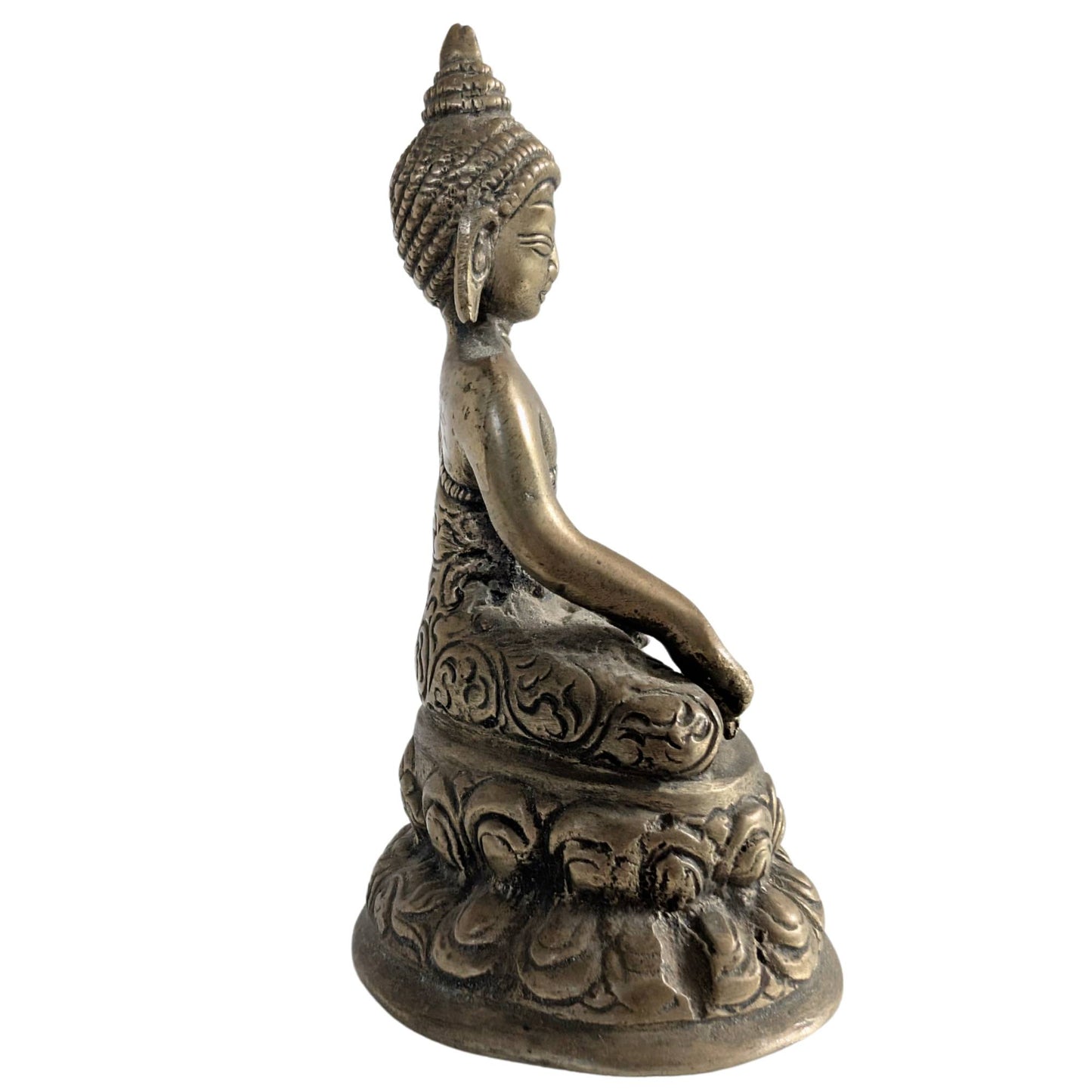 Detail of the swastika symbol on the palm of the Buddha figurine.