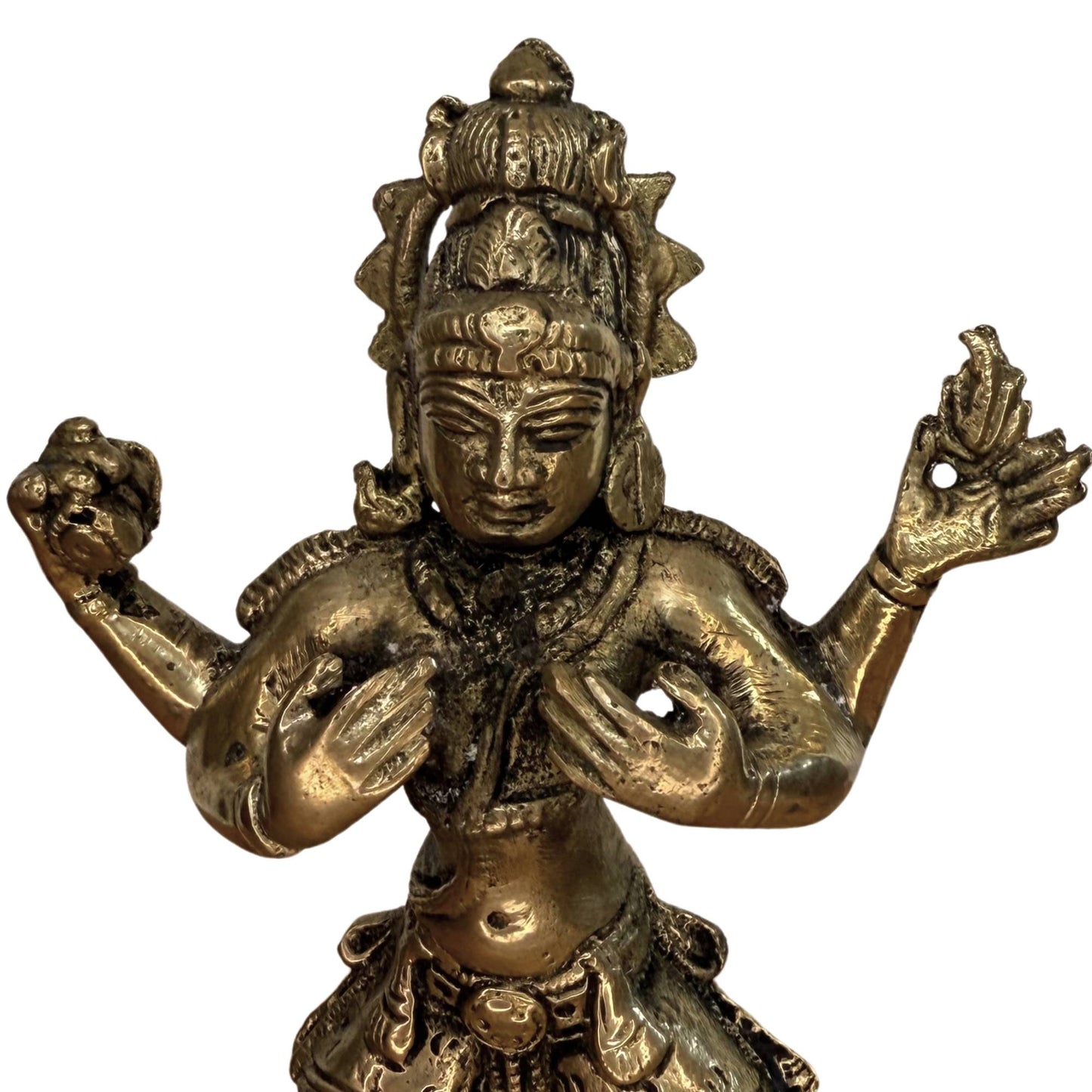 Close-up of the torso and the Damaru drum, a symbol of the heartbeat of the cosmos.