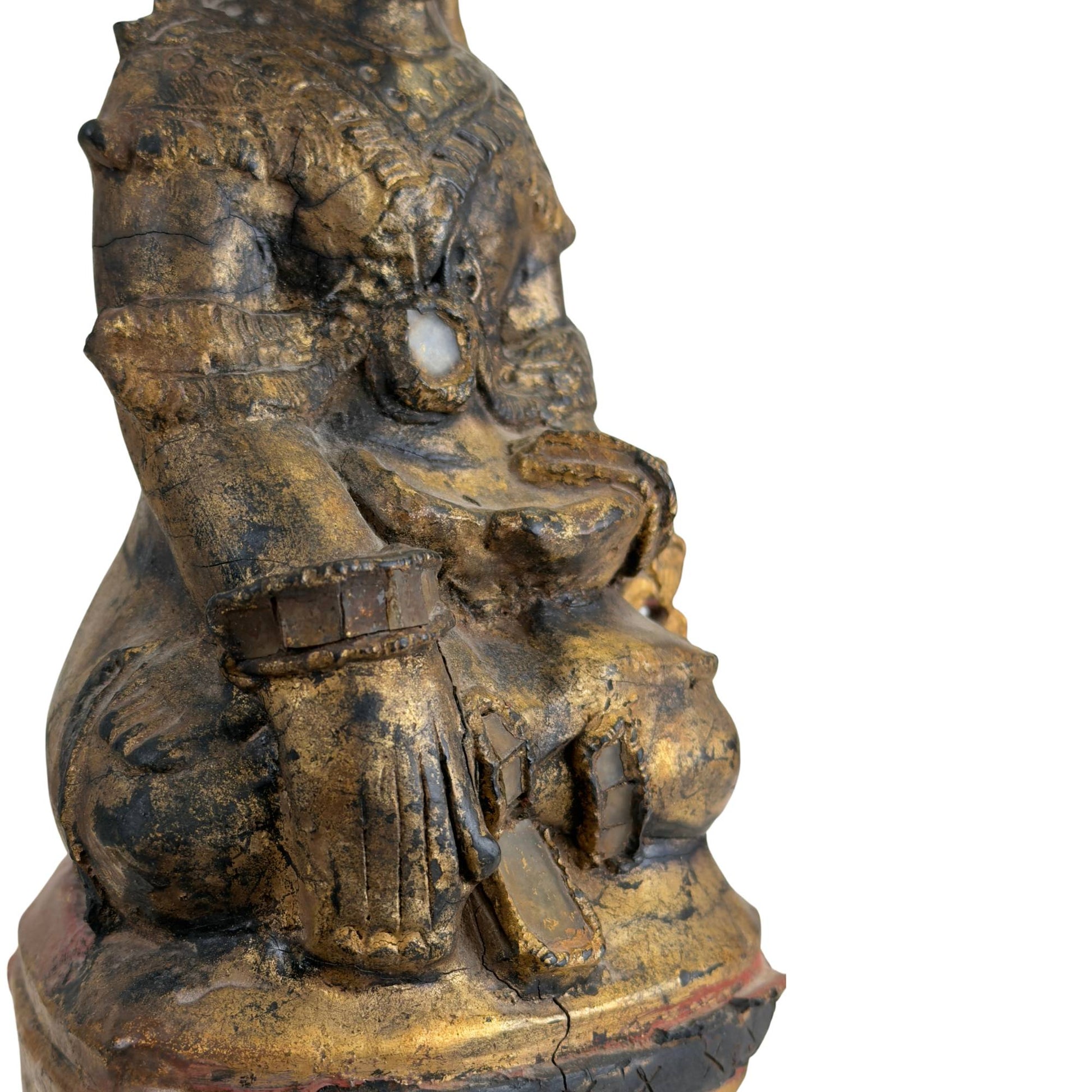 Detail of gilding on Burmese temple figure