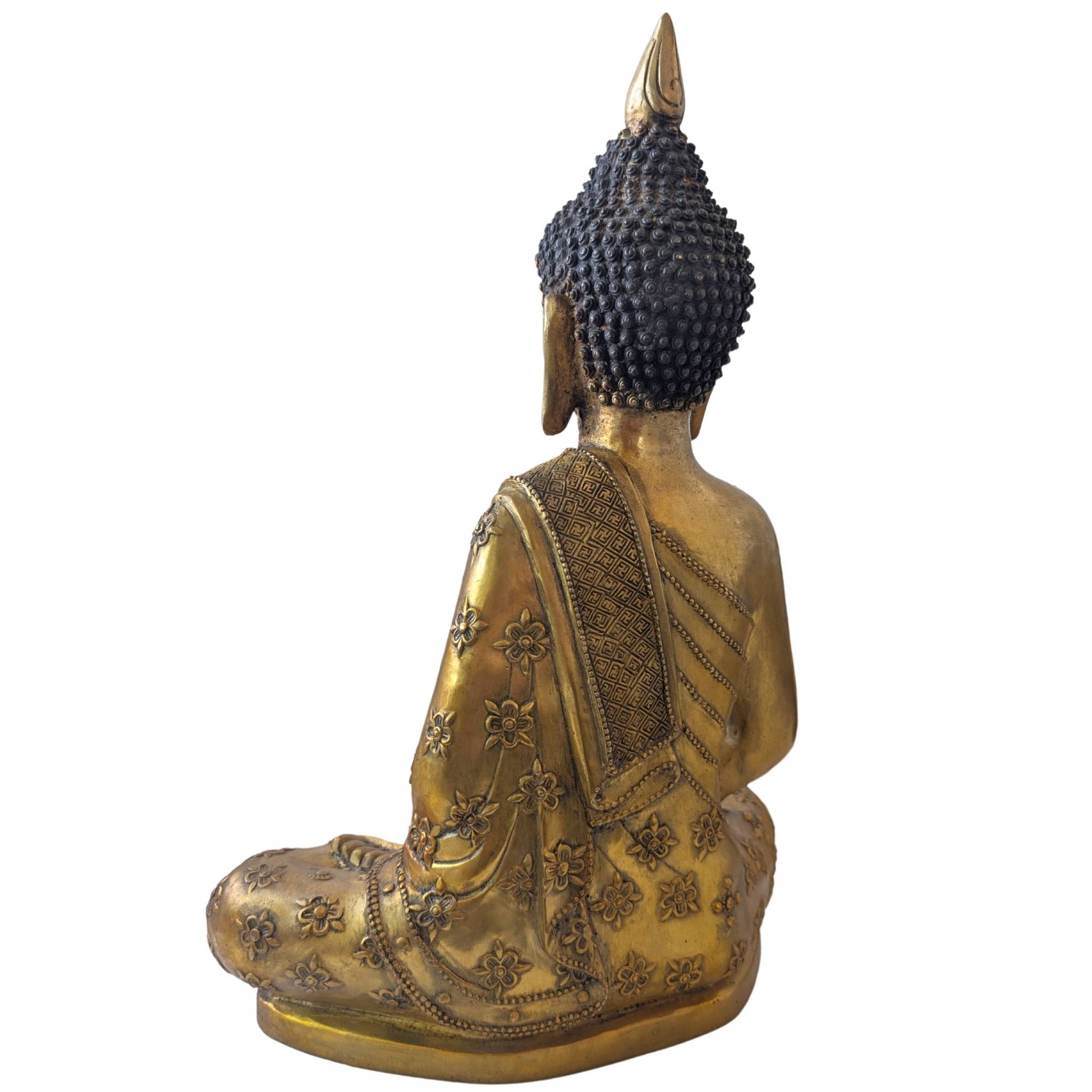 Close-up of the Dhyana Mudra hand gesture of an authentic Tibetan Buddhist bronze-colored statue.