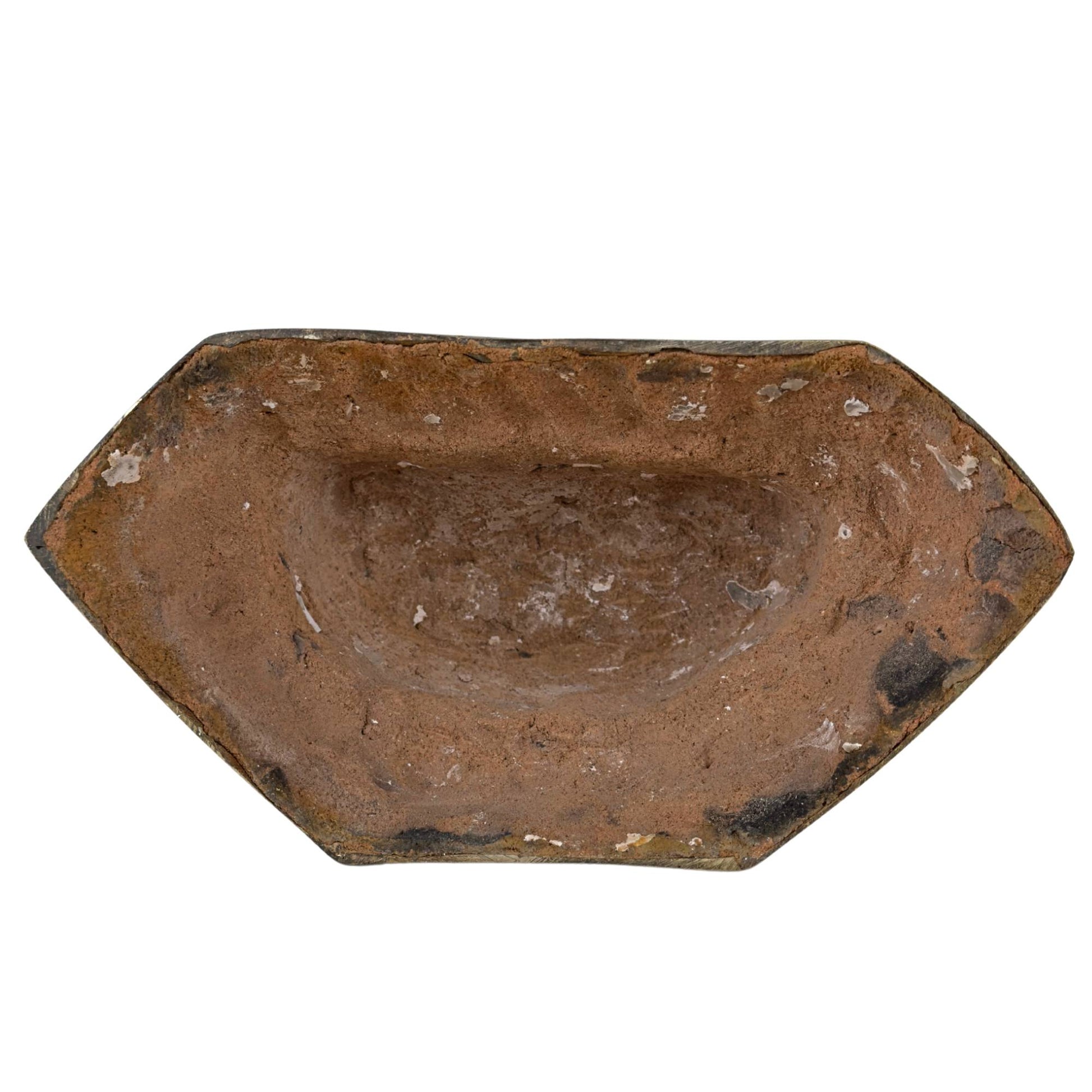 The richly decorated lotus base on the characteristic hexagonal foot.