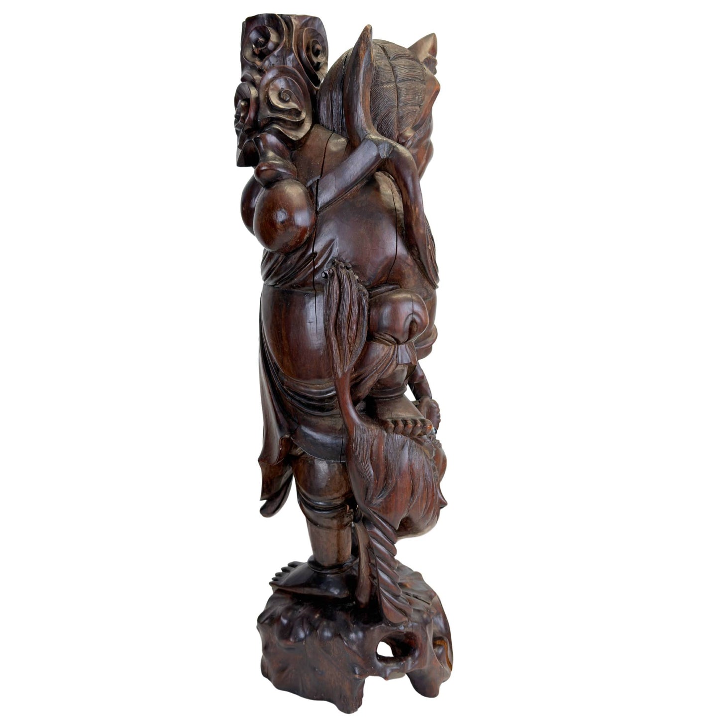 Rear view of the hand-carved Ebisu statue with traditional texture
