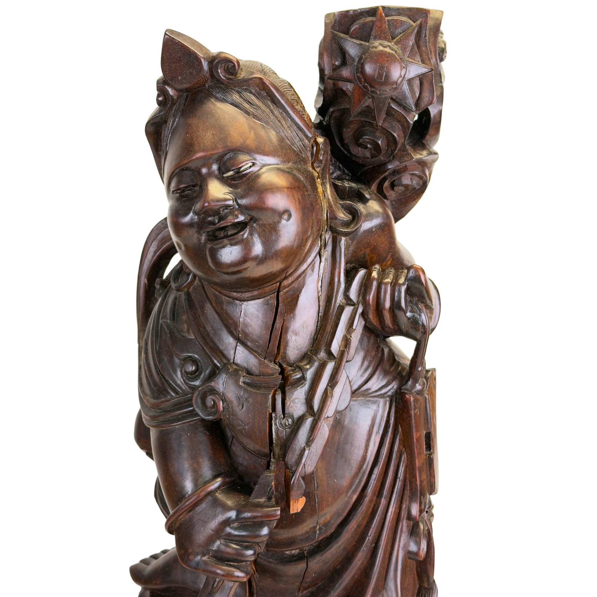Expressive facial features of the antique wooden Ebisu statue