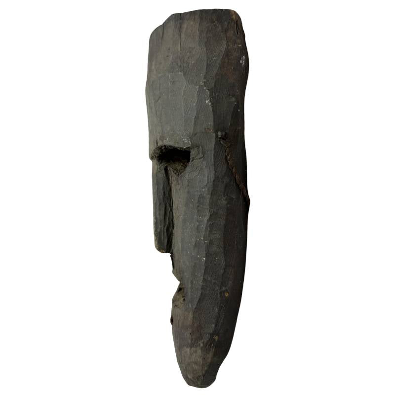Ethnographic hand-carved wooden mask from Nepal
