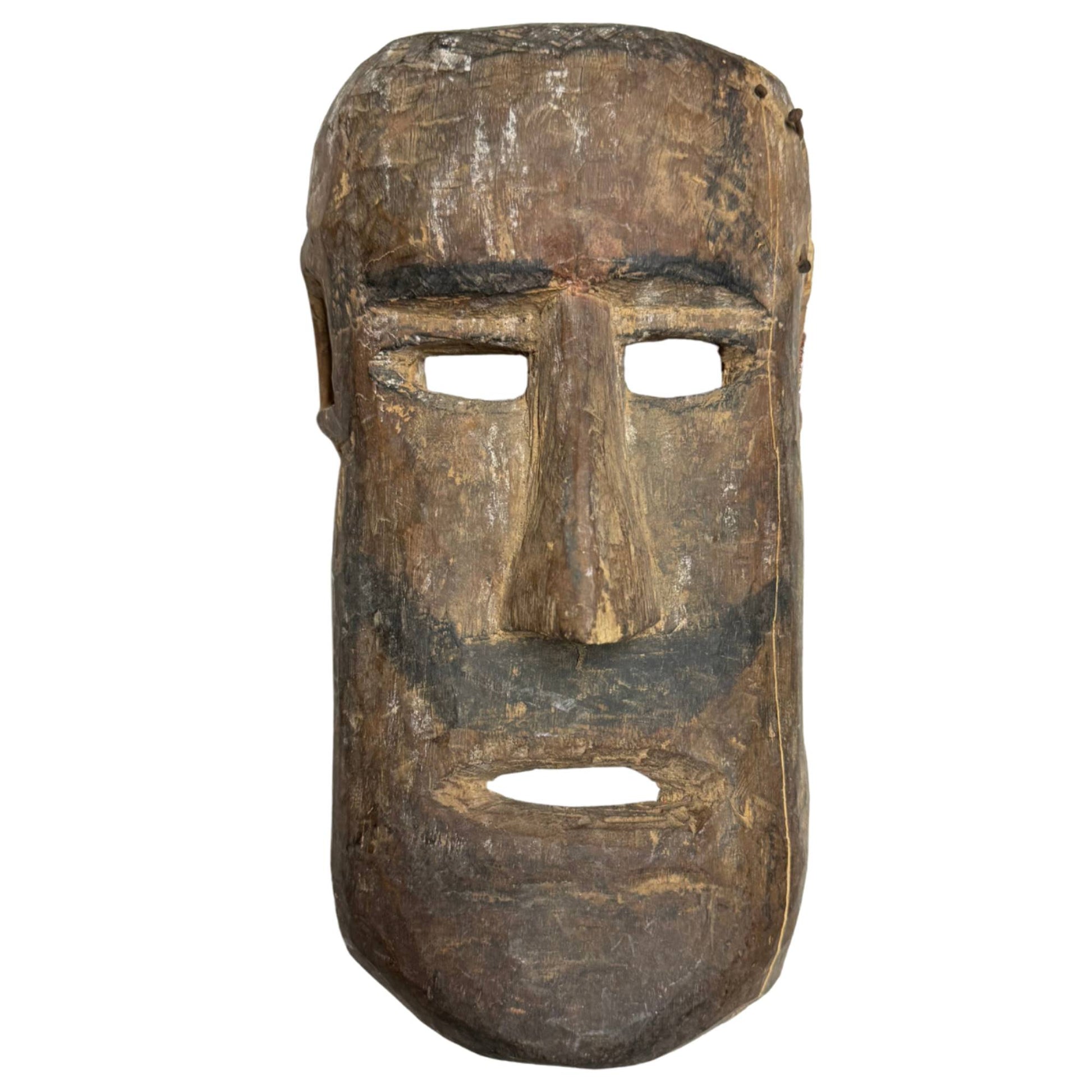 Exclusive antique hand-carved wooden shaman mask from the Himalayas, with black beard line and incised diamond patterns