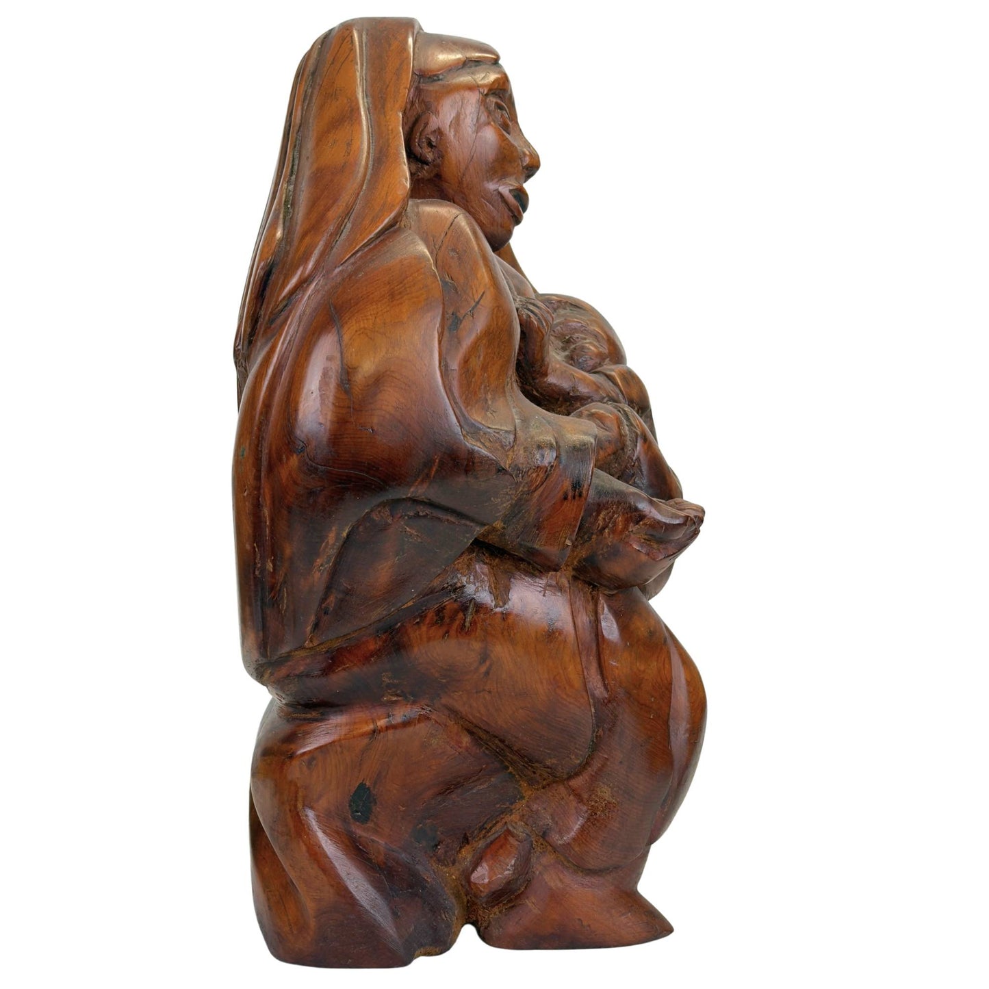 Expressive Madonna and Child in hand-carved folk art style