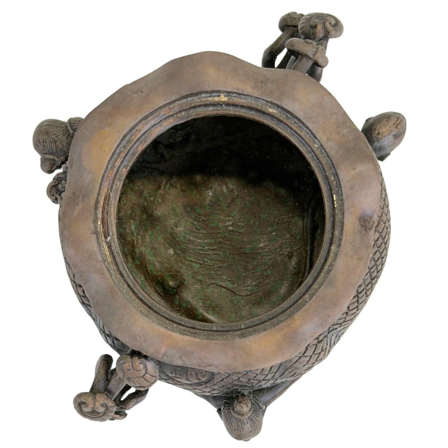 Detail of wealth symbols on a Chinese Feng Shui treasure pot