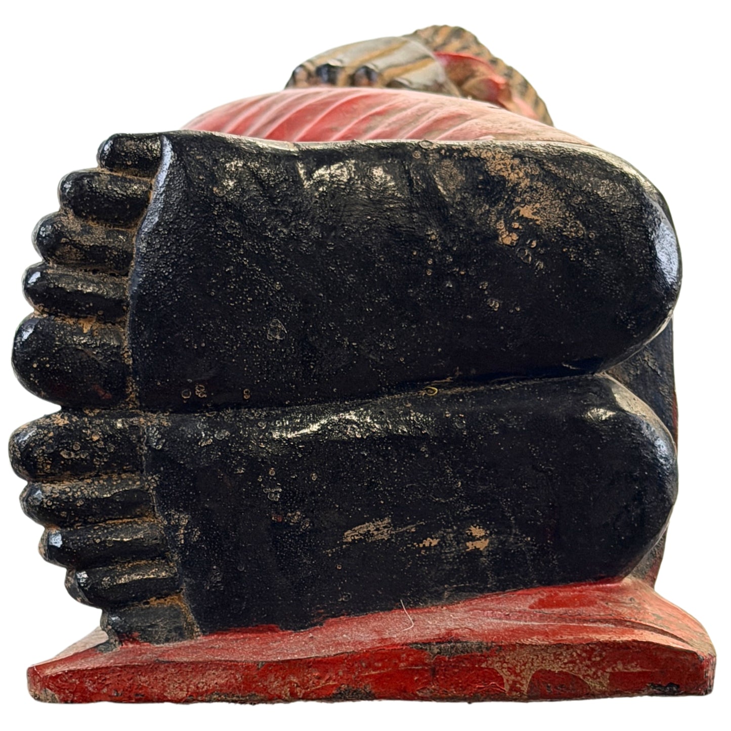 Frontal detail of both feet of the antique reclining Buddha