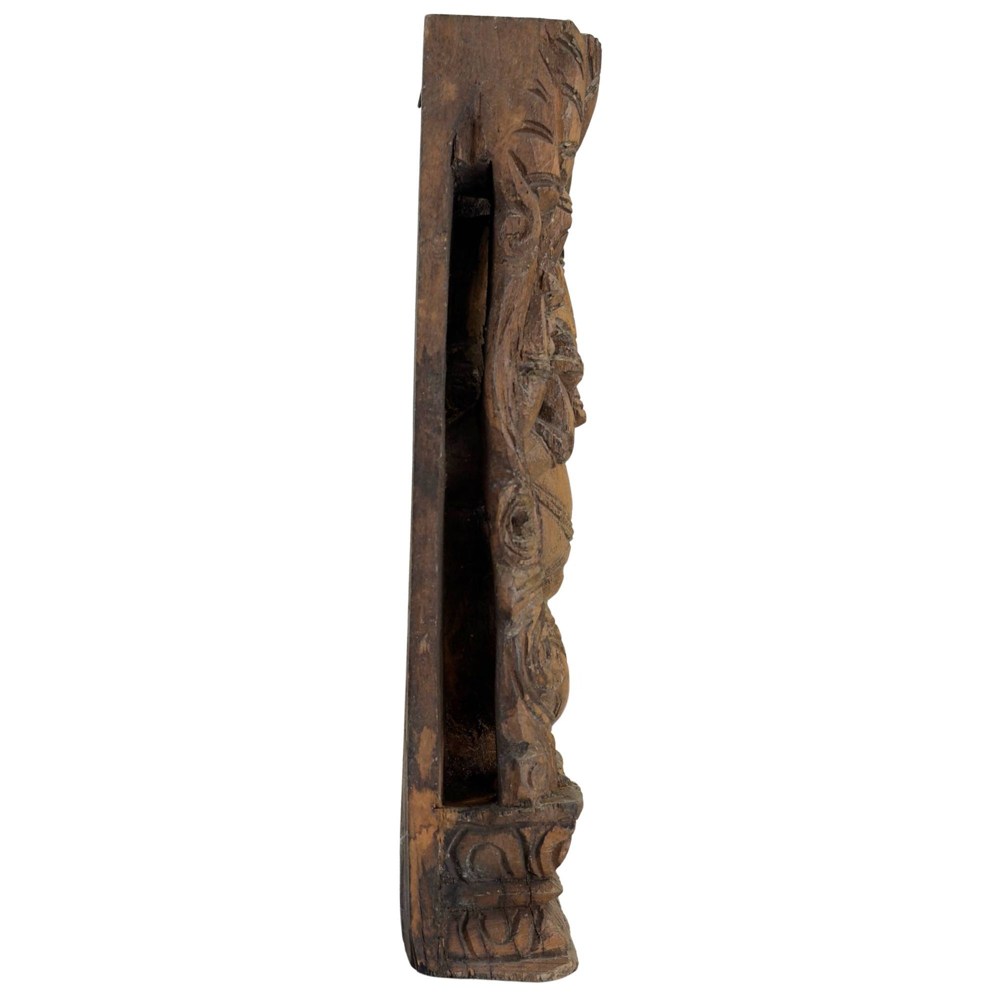 Wooden Ganesha relief with deep hand-carved details and side view