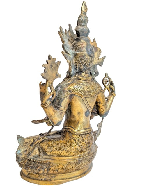 Detailed bronze casting of an Asian Bodhisattva with lotus flower