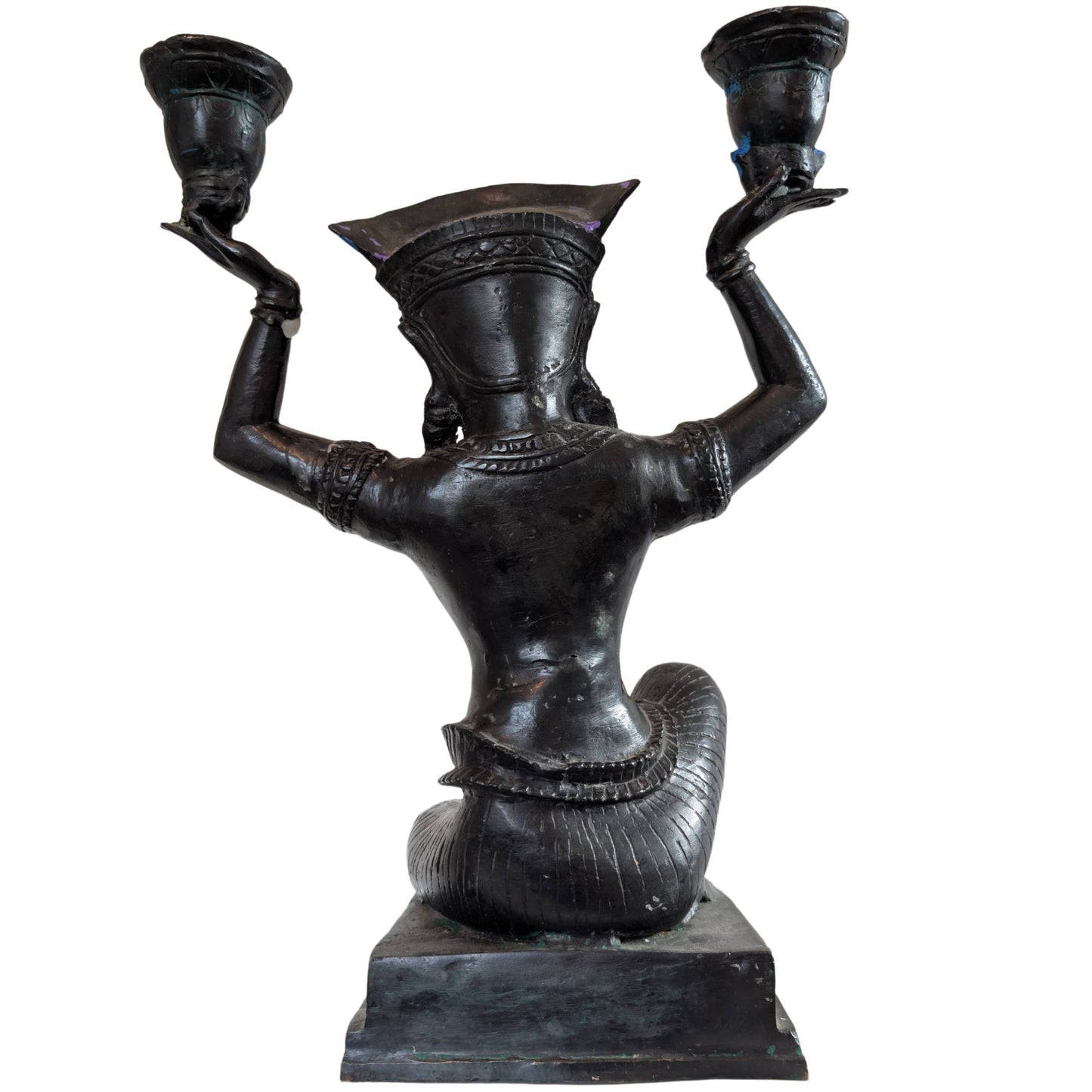 Detail of the detailed headdress on a bronze Yakshi