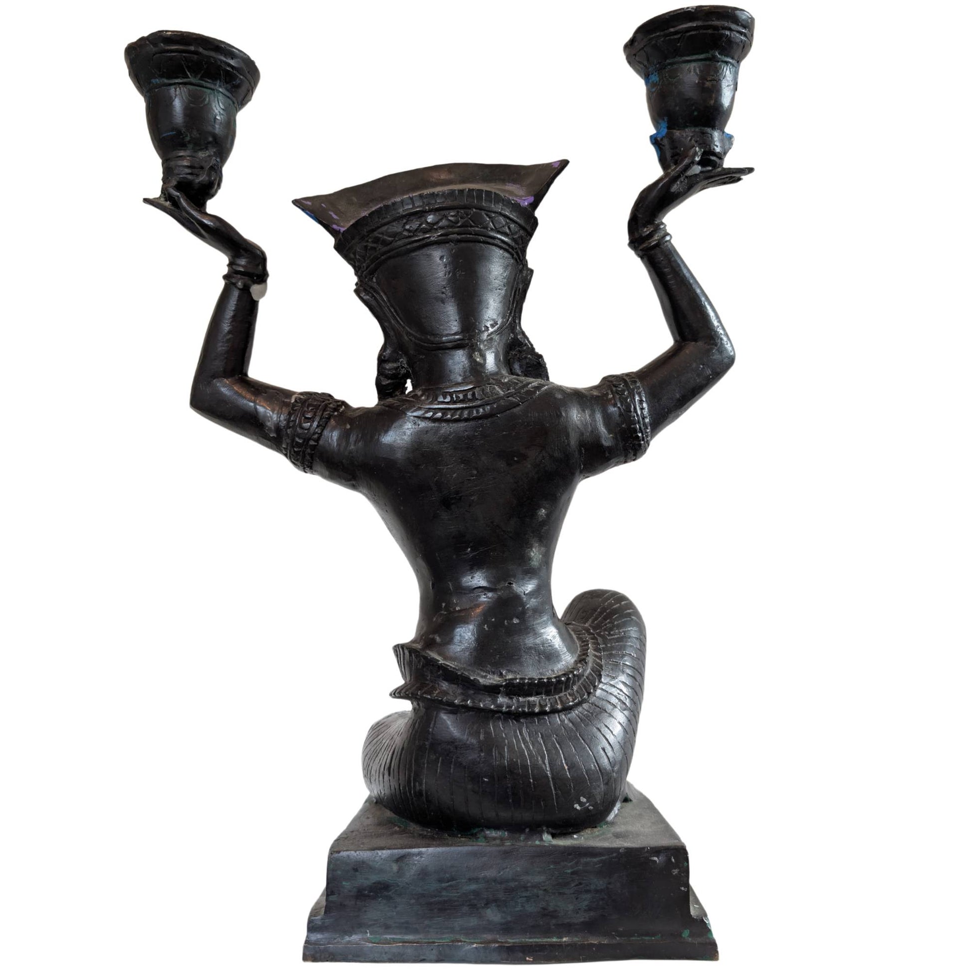 Detail of the detailed headdress on a bronze Yakshi
