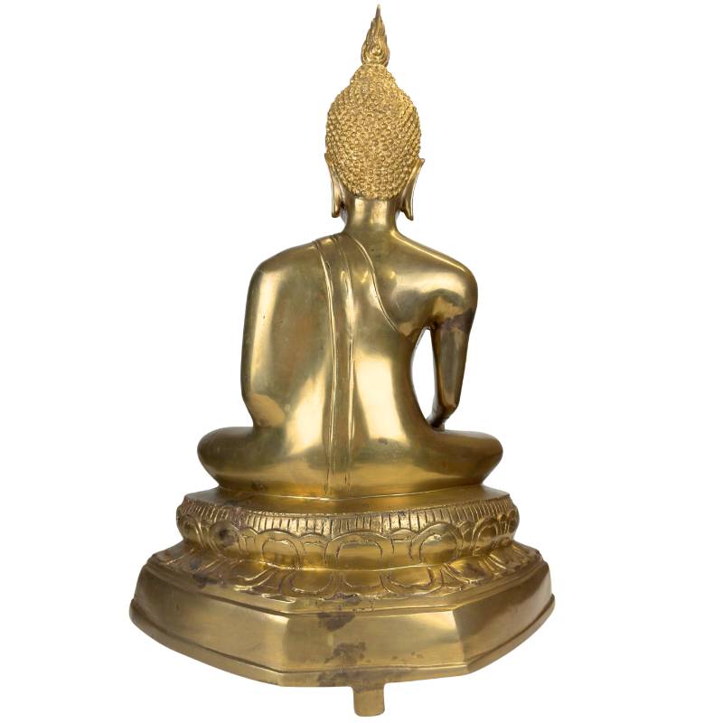 Detail of the serene face of an antique Thai Buddha from the 19th century.