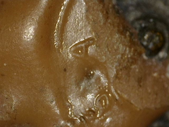 Stamped lacquer mark on the head of a Chinese bronze Buddha statue