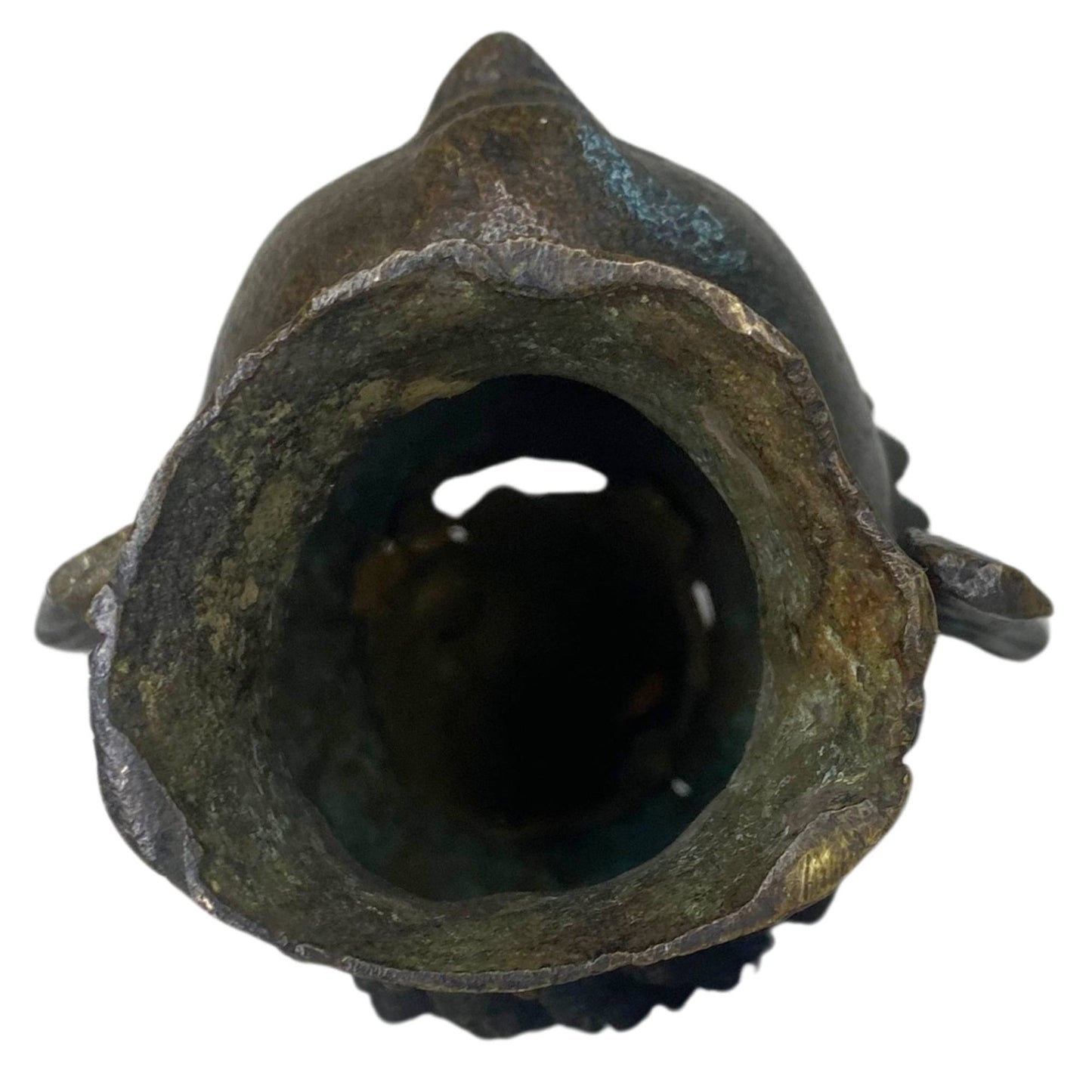 Photo of the interior shows the rough, authentic casting structure and wall thickness.