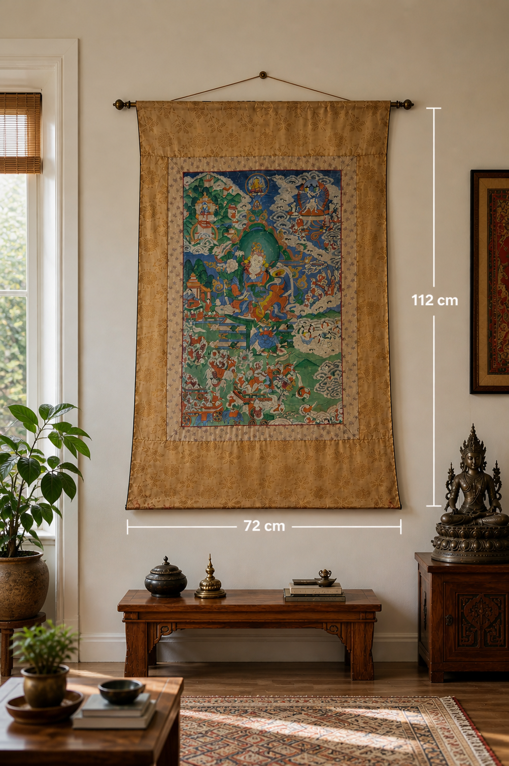 Detail of the gold-colored silk brocade with woven floral motifs of the thangka frame