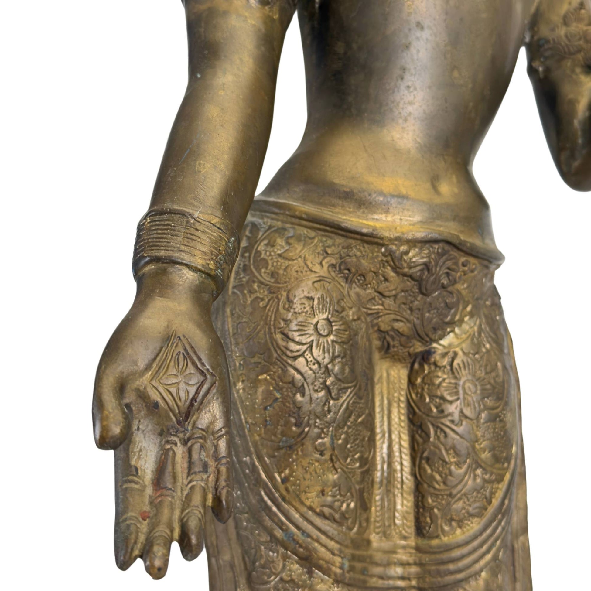 Detail of the back with traditional Nepalese hairstyle and crown construction.