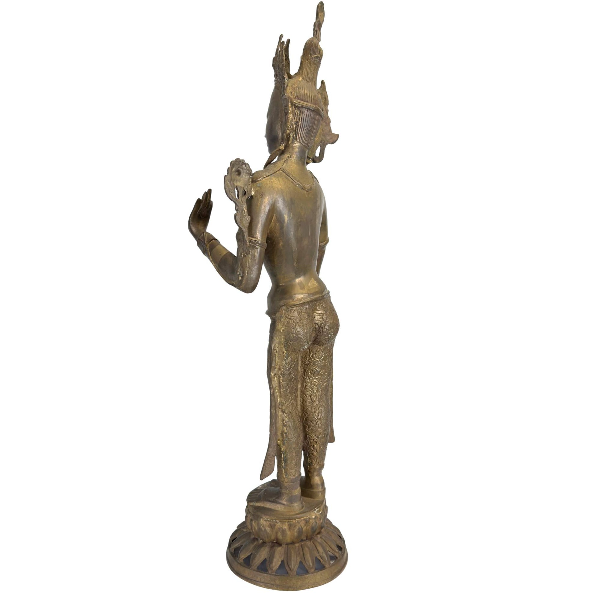 Right profile of an antique Nepalese Green Tara on an openwork lotus base.