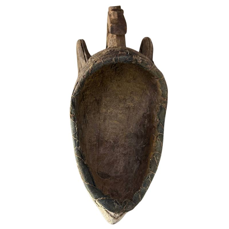 Large African ritual mask, wooden tribal art object with open structure, old patina and powerful presence
