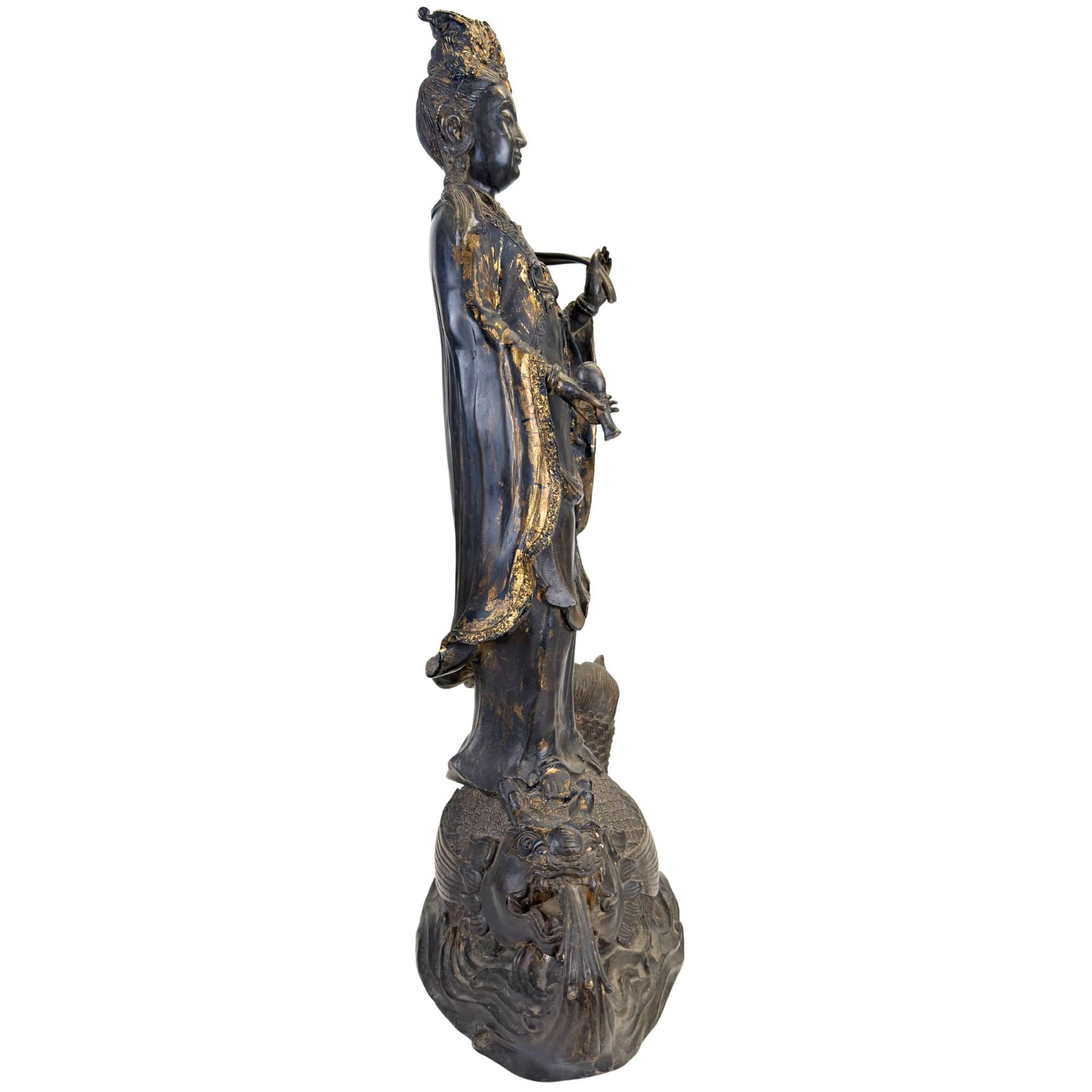 Large Guanyin statue with dragonfish and carved water motifs, 64 cm high and 16 kg heavy