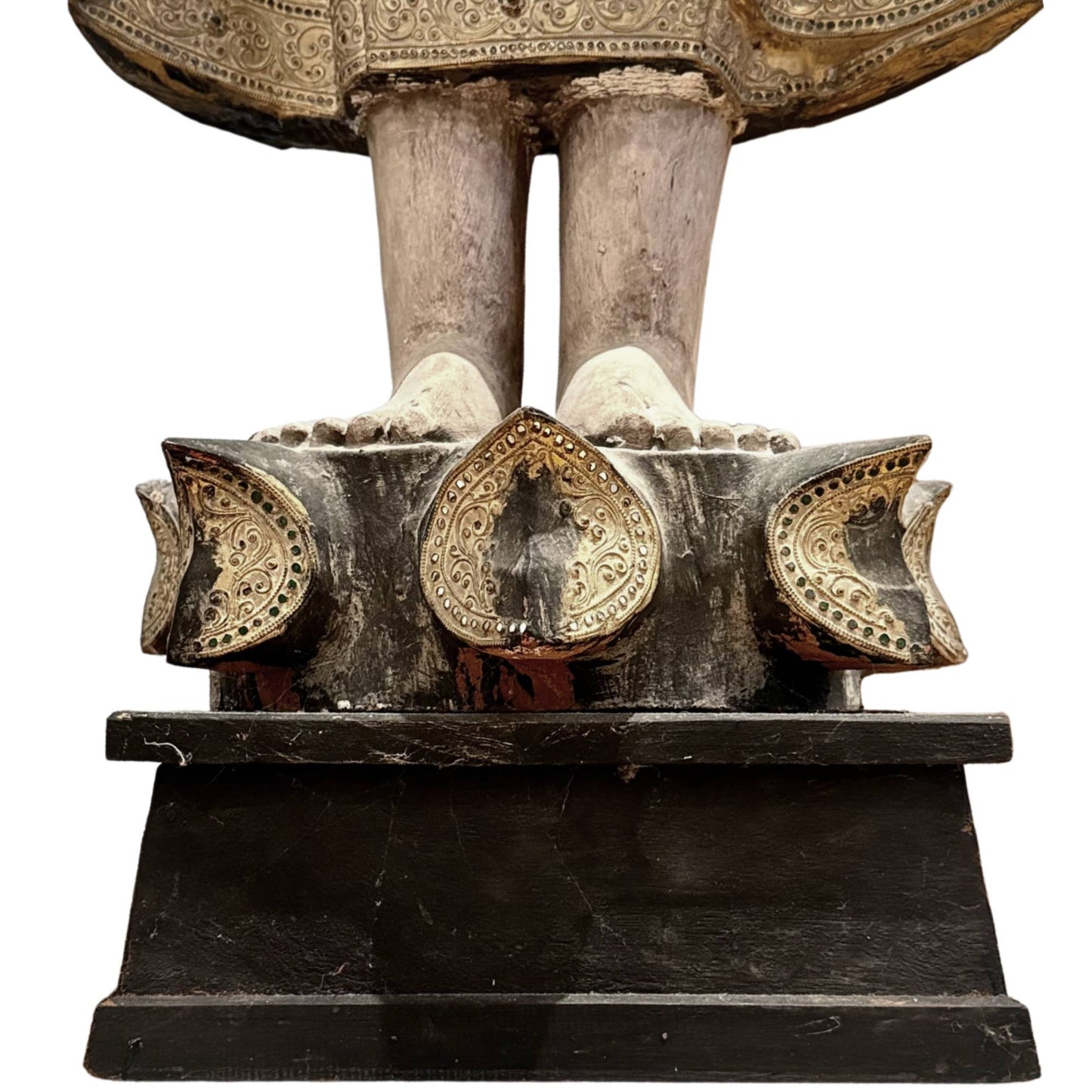 Large wooden Buddha temple statue, antique Burmese statue with gilded ornaments and an impressive sacred appearance