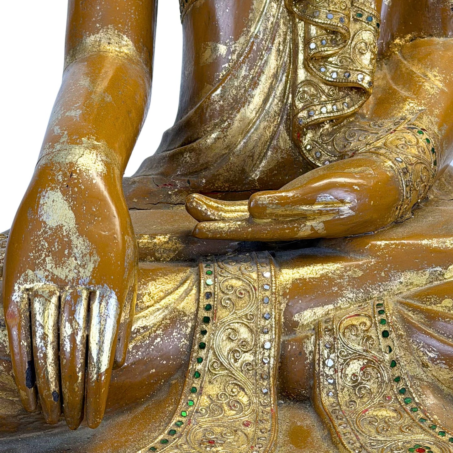 Large antique Burmese Buddha in Mandalay style with gold lacquer, inlaid eyes, and richly decorated throne
