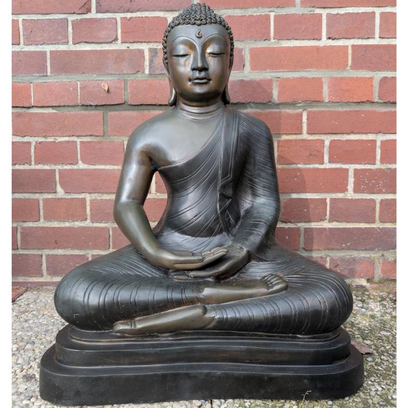 Large Theravada Buddha in bronze, temple statue Sri Lanka