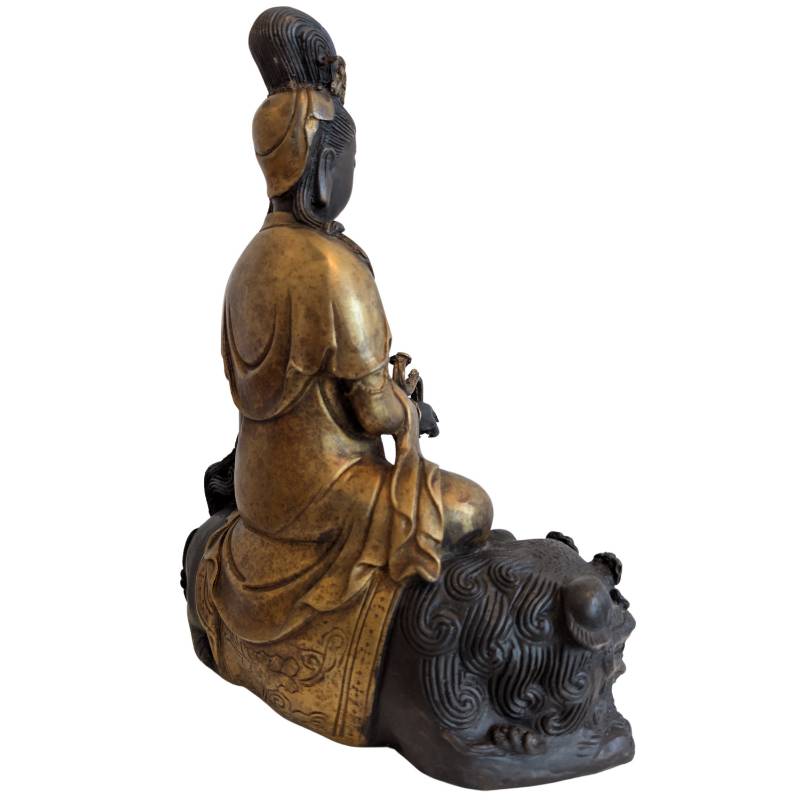 Guanyin Avalokiteshvara on a lion from China