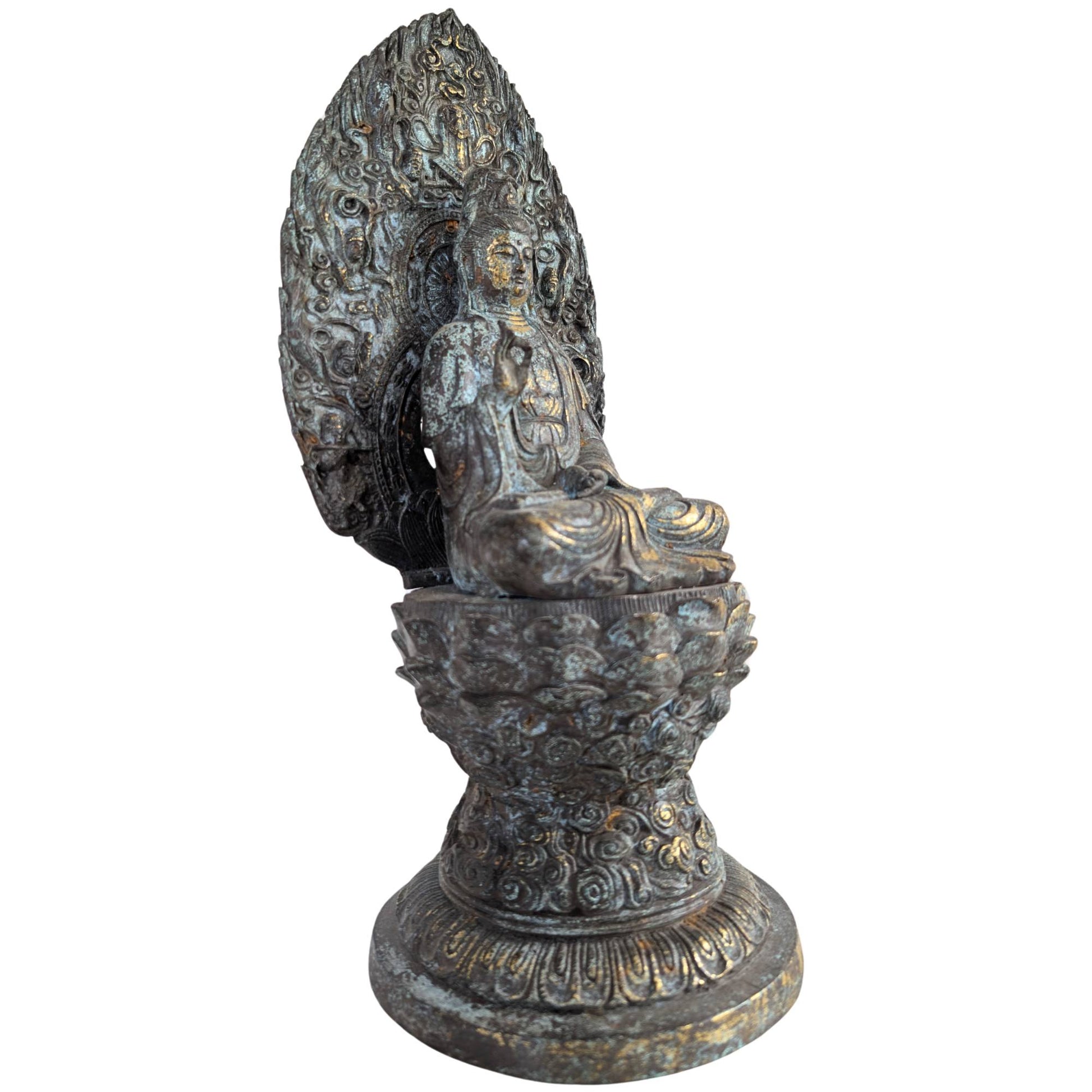 Detail of the seated Guanyin with visible traces of original gilding on the bronze.