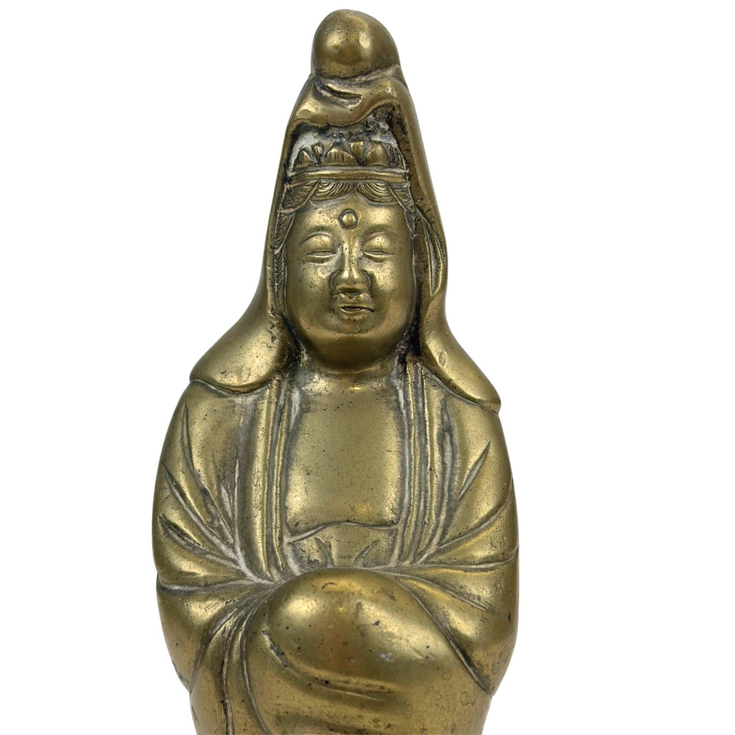 Detail of Guanyin's face with a calm and friendly expression